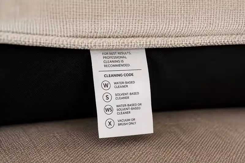 Fabric sofa cleaning code label showing W S WS and X symbols