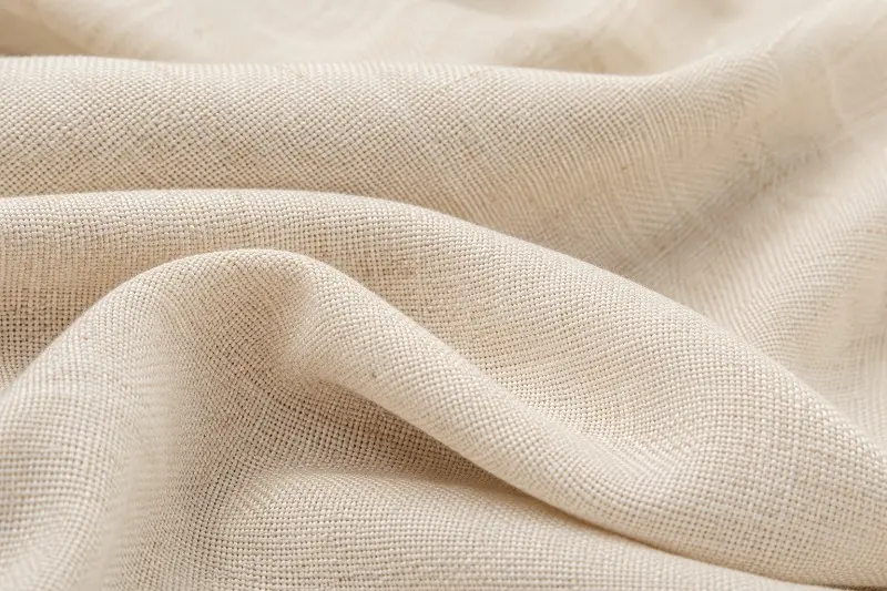close-up of natural cotton upholstery fabric texture in beige